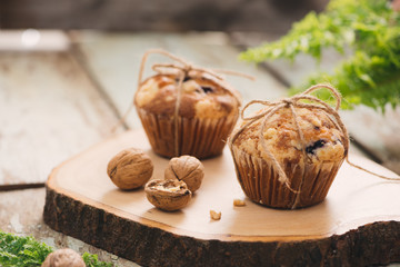 Dellicious homemade nut muffins on table. Sweet pastries