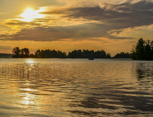 Summer dawn on lake Vuoksa in the Leningrad region.  Priozersky district, the island of bad Luck located on lake Vuoksa.