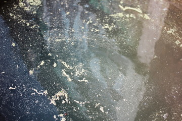 abstract patterns and reflection on dirty water