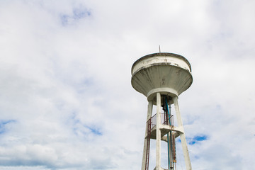 Water tank and blue sky background with copy space