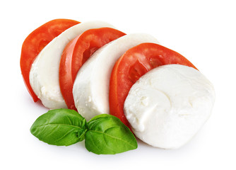 Mozzarella tomatoes and basil isolated on white background.