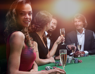 brunette girl in the casino playing poker