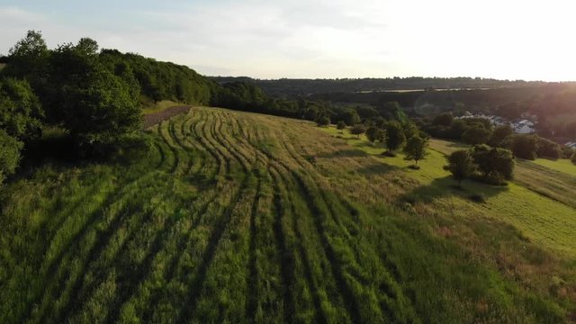 Flight over farmlands in the country - aerial drone footage