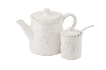 White ceramic teapot for coffee or tea and a sugar bowl