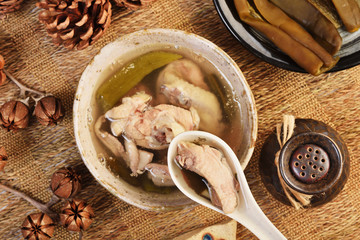 Peeled chili pepper chicken soup on the table 