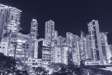 high rise residential building in Hong Kong city at night