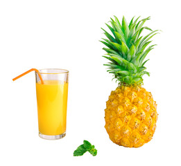 A glass of pineapple juice with a straw and pineapple with mint leaves isolated on white background.