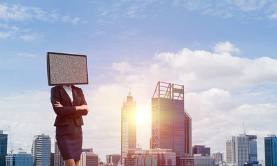 Business woman with TV instead of head.