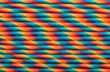 Vintage colored paper straws abstract background