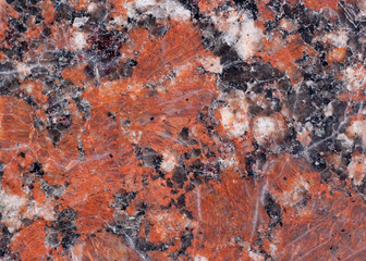 Granite texture. Reddish-brown base with black and gray spots. Used as a background.