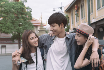 Group of tourist backpacker friends traveling in Bangkok,Thailand
