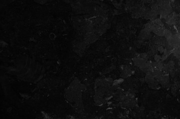 Black marble texture with light veins and spots. Perfect natural pattern for background or tile  