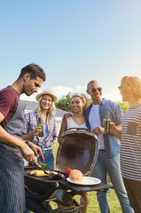 Friends enjoying barbeque outdoor