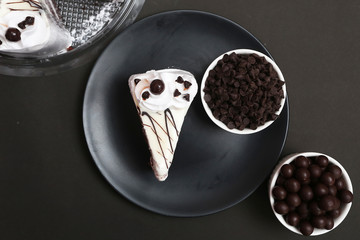 White chocolate cake and chocolate ball topping