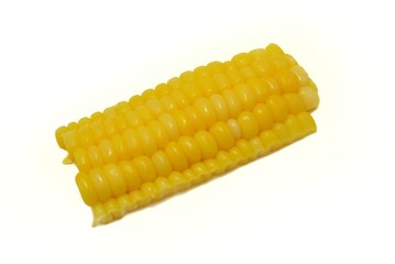 Top view of sweet corn with slices isolated on white background.