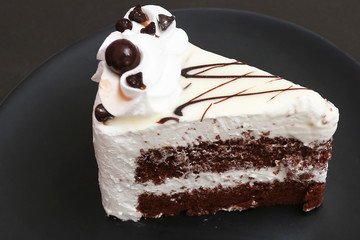 White chocolate cake and chocolate ball topping