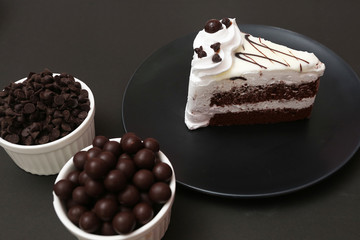 White chocolate cake and chocolate ball topping