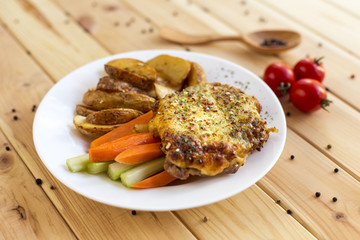 Pork with vegetables. A large portion. Photo for your menu