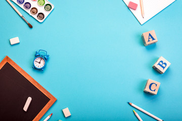 stationery on blue, school, back, learn, nine am, alarm, desktop, concept, copy space