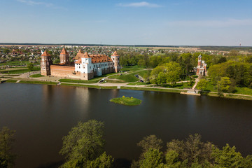 Fototapeta na wymiar Beautiful aerial view of Medieval Mir castle complex on sunny sp