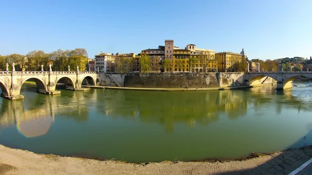 Timelapse view on the river Tiber between two historic Bridges in Rome.
