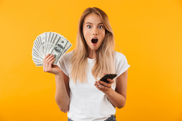 Portrait of an amazed young blonde girl