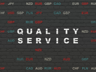 Finance concept: Painted white text Quality Service on Black Brick wall background with Currency