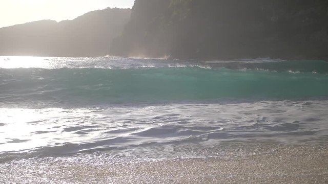 Close up of Waves on Kelingking beach in super slowmotion