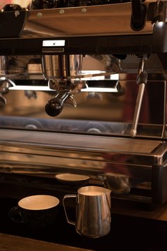 Close-up of espresso near machine