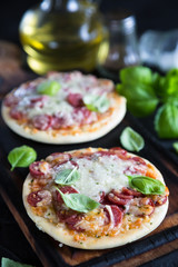 Mini pizzas with pepperoni and cheese
