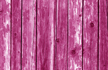 Old wooden fence pattern in pink color.