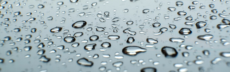 Raindrops on the glass. Wet rainy day.