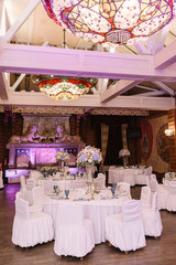 A wedding table for guests. Round banquet table