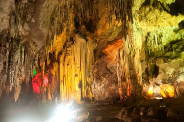 The colorful limestone formations at Khao Bin Cave in Thailand.