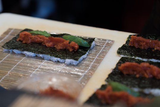 Unrolled sushi kept on table