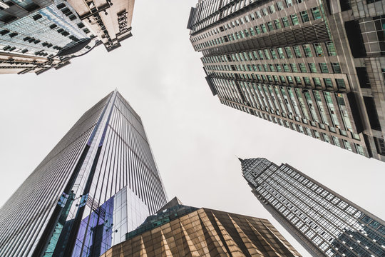 From below of skyscrapers under sky