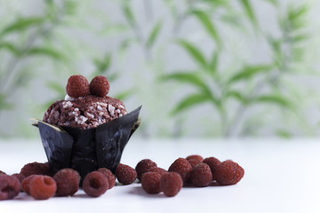 cupcake with raspberries