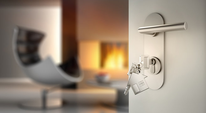 Offene T&uuml;r mit Schl&uuml;sseln vor gem&uuml;tlichem Wohnzimmer