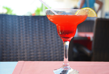 margarita cocktail in a glass on a background of bright lights.