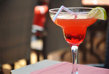 margarita cocktail in a glass on a background of bright lights.