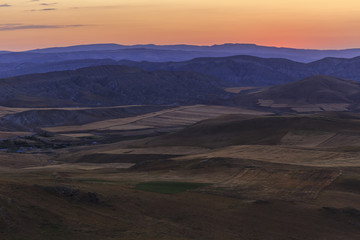 Fototapeta na wymiar Sunrise in the mountains of Gobustan
