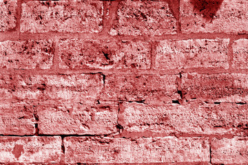 Ancient stone wall in red tone.
