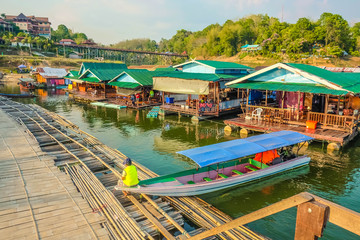 Fototapeta na wymiar Boat Dock And Resort in Songgaria Cross river walk Bridge Sangkhla Buri kanchanaburi thailand