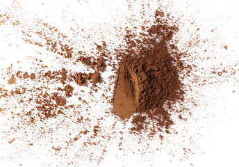 Cocoa powder pile isolated on white background, top view