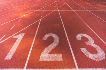 Starting line position of running track background texture, lane number 1, 2, 3. Business...