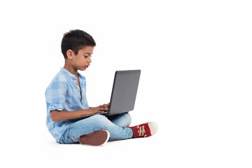 Little boy search and learning education with laptop , he feel fun and happy