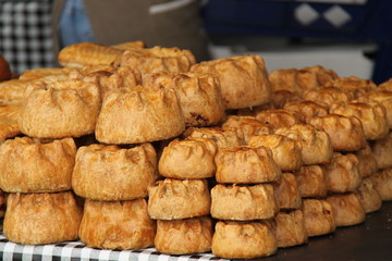 A Stack of Freshly Baked Home Made Pork Pies.