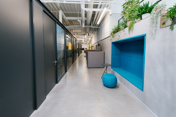 Hallway of modern office with colorful elements