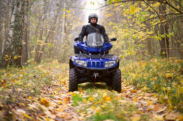 Man driving off-road on a ATV.