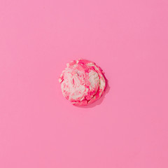 Vanilla and strawberry ice cream on pastel pink background. Summer minimalism. Flat lay.